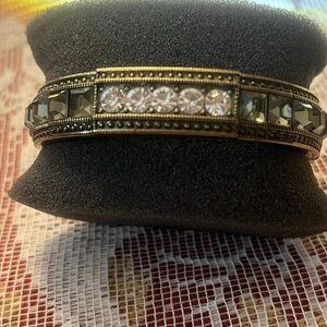 Heidi Daus’s clear and dark gray clamper bracelet